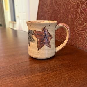 Handmade Speckled Stoneware Coffee Mug  with a Carved Maple Leaf Design